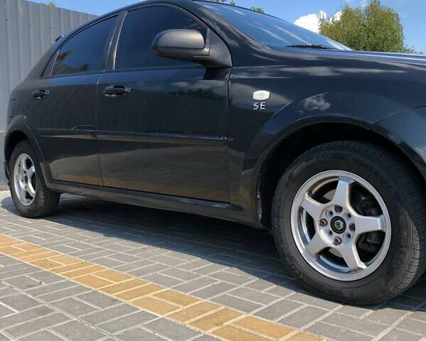 Черный Шевроле Лачетти, объемом двигателя 1.6 л и пробегом 334 тыс. км за 4200 $, фото 7 на Automoto.ua