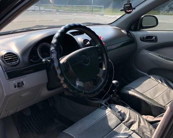 Черный Шевроле Лачетти, объемом двигателя 1.6 л и пробегом 334 тыс. км за 4200 $, фото 16 на Automoto.ua