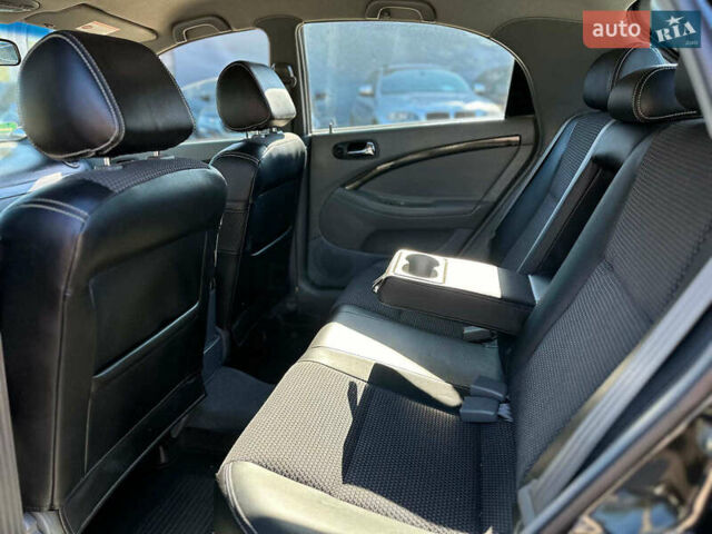 Черный Шевроле Лачетти, объемом двигателя 1.8 л и пробегом 146 тыс. км за 4990 $, фото 14 на Automoto.ua