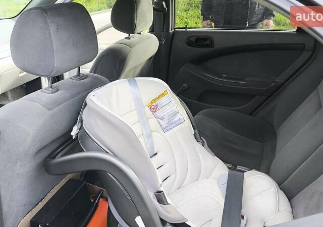 Черный Шевроле Лачетти, объемом двигателя 1.6 л и пробегом 251 тыс. км за 3500 $, фото 10 на Automoto.ua