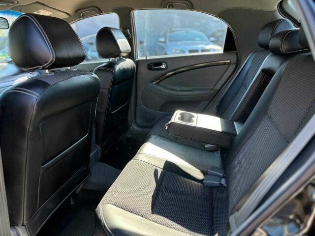 Черный Шевроле Лачетти, объемом двигателя 1.8 л и пробегом 146 тыс. км за 4790 $, фото 14 на Automoto.ua