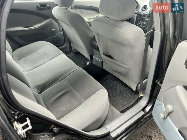 Черный Шевроле Лачетти, объемом двигателя 1.6 л и пробегом 110 тыс. км за 4600 $, фото 46 на Automoto.ua