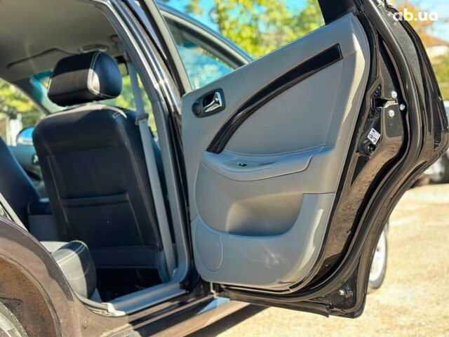 Черный Шевроле Лачетти, объемом двигателя 1.8 л и пробегом 146 тыс. км за 4990 $, фото 12 на Automoto.ua