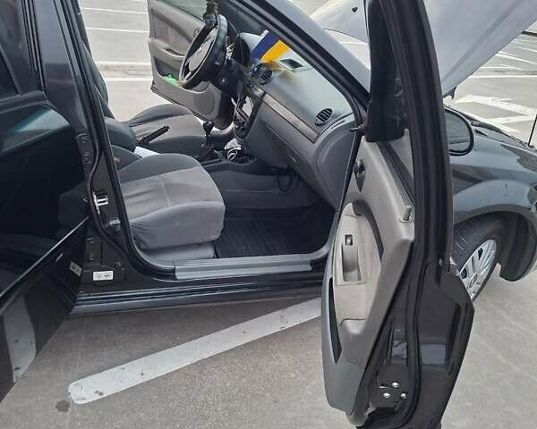 Черный Шевроле Лачетти, объемом двигателя 1.6 л и пробегом 217 тыс. км за 4000 $, фото 8 на Automoto.ua