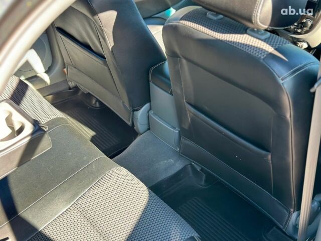 Черный Шевроле Лачетти, объемом двигателя 1.8 л и пробегом 146 тыс. км за 4990 $, фото 13 на Automoto.ua