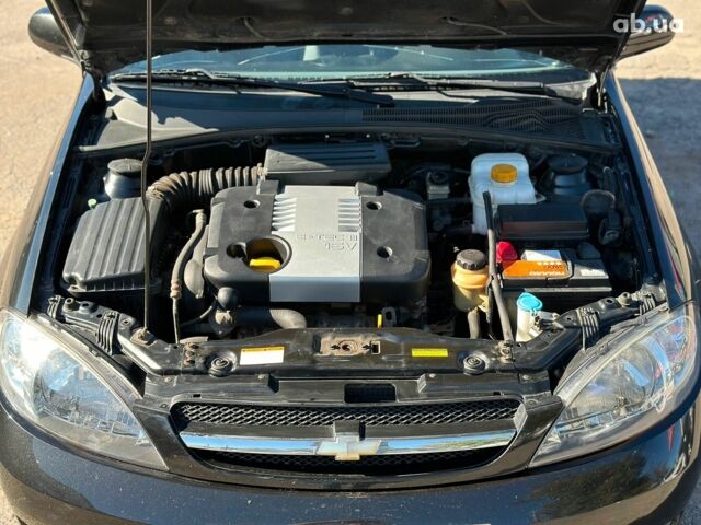 Черный Шевроле Лачетти, объемом двигателя 1.8 л и пробегом 146 тыс. км за 4990 $, фото 36 на Automoto.ua