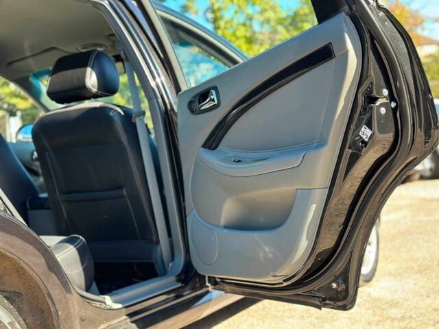 Черный Шевроле Лачетти, объемом двигателя 1.8 л и пробегом 146 тыс. км за 4790 $, фото 12 на Automoto.ua