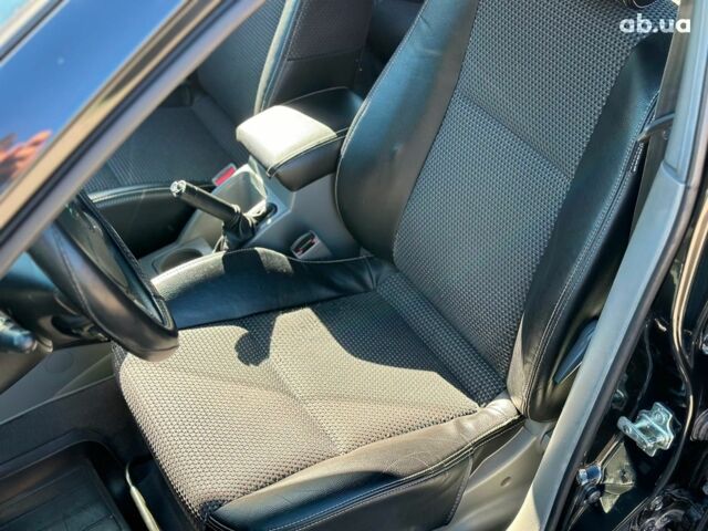 Черный Шевроле Лачетти, объемом двигателя 1.8 л и пробегом 146 тыс. км за 4990 $, фото 26 на Automoto.ua