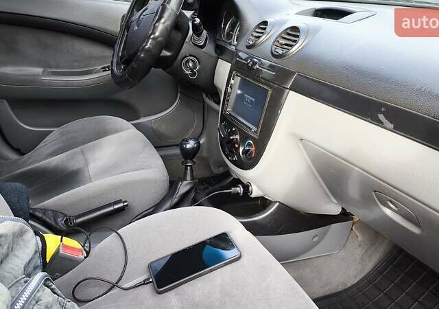 Черный Шевроле Лачетти, объемом двигателя 1.6 л и пробегом 251 тыс. км за 3500 $, фото 17 на Automoto.ua