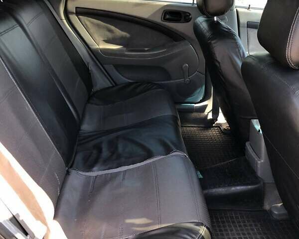 Черный Шевроле Лачетти, объемом двигателя 1.6 л и пробегом 334 тыс. км за 4200 $, фото 14 на Automoto.ua