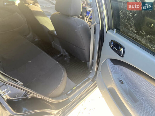 Черный Шевроле Лачетти, объемом двигателя 1.8 л и пробегом 195 тыс. км за 4500 $, фото 10 на Automoto.ua