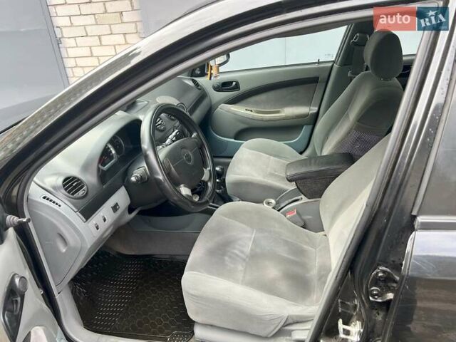 Черный Шевроле Лачетти, объемом двигателя 1.6 л и пробегом 110 тыс. км за 4600 $, фото 42 на Automoto.ua