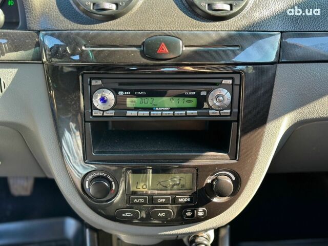 Черный Шевроле Лачетти, объемом двигателя 1.8 л и пробегом 146 тыс. км за 4990 $, фото 29 на Automoto.ua