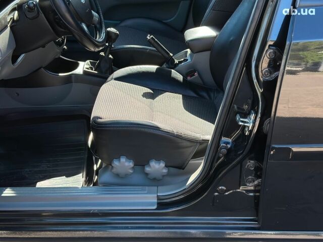 Черный Шевроле Лачетти, объемом двигателя 1.8 л и пробегом 146 тыс. км за 4990 $, фото 21 на Automoto.ua