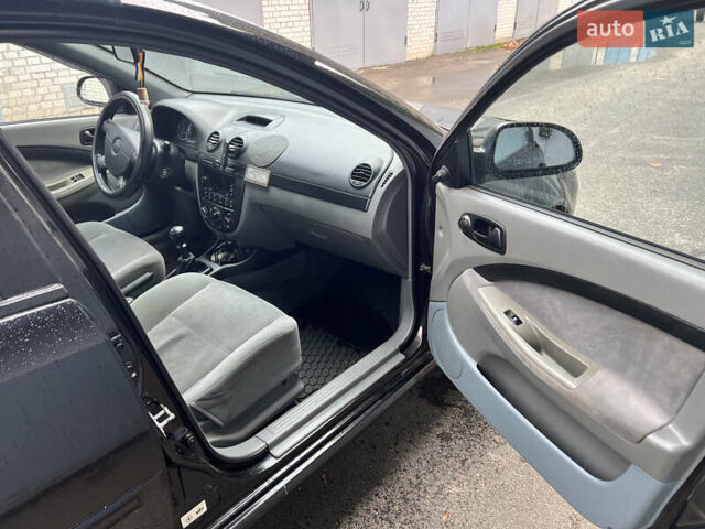 Черный Шевроле Лачетти, объемом двигателя 1.6 л и пробегом 110 тыс. км за 4600 $, фото 48 на Automoto.ua