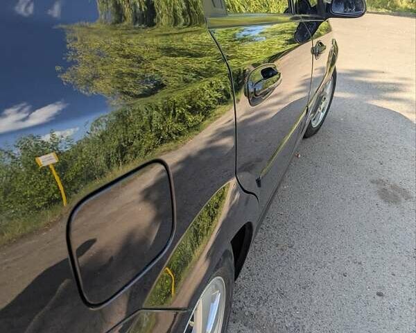 Черный Шевроле Лачетти, объемом двигателя 1.8 л и пробегом 134 тыс. км за 6450 $, фото 8 на Automoto.ua