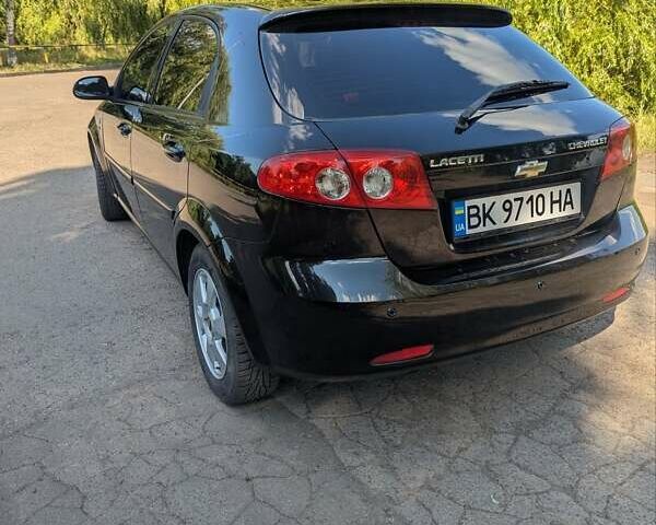 Черный Шевроле Лачетти, объемом двигателя 1.8 л и пробегом 134 тыс. км за 6450 $, фото 7 на Automoto.ua