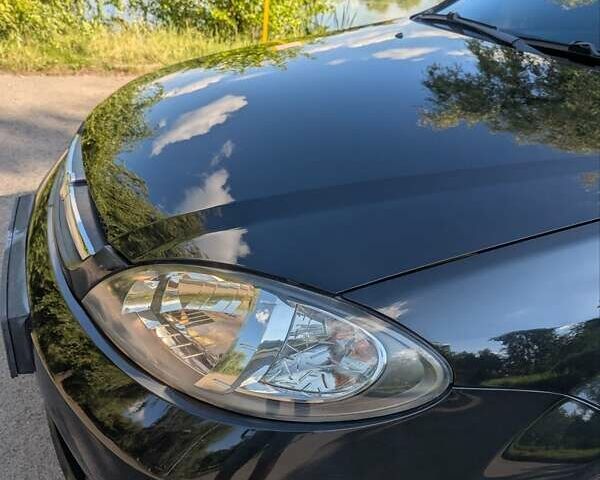 Черный Шевроле Лачетти, объемом двигателя 1.8 л и пробегом 134 тыс. км за 6450 $, фото 11 на Automoto.ua