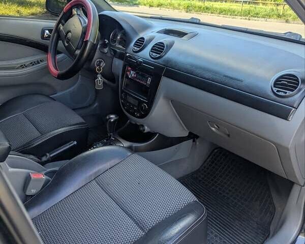 Черный Шевроле Лачетти, объемом двигателя 1.8 л и пробегом 134 тыс. км за 6450 $, фото 24 на Automoto.ua