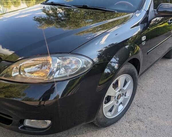 Черный Шевроле Лачетти, объемом двигателя 1.8 л и пробегом 134 тыс. км за 6450 $, фото 14 на Automoto.ua