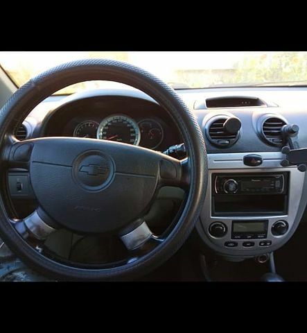 Черный Шевроле Лачетти, объемом двигателя 1.8 л и пробегом 162 тыс. км за 4900 $, фото 2 на Automoto.ua