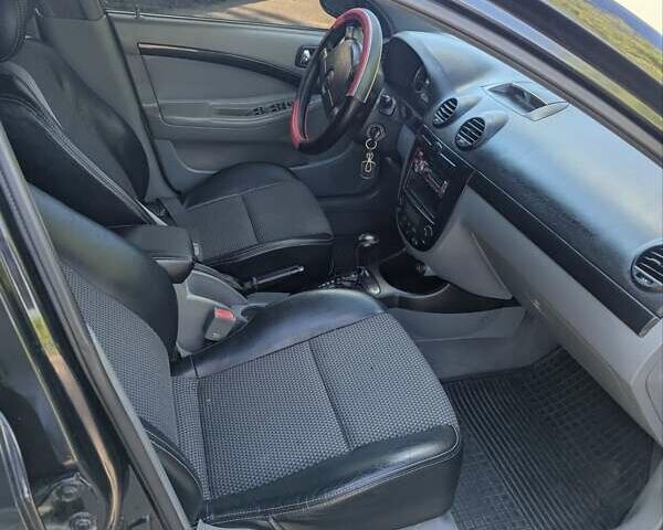 Черный Шевроле Лачетти, объемом двигателя 1.8 л и пробегом 134 тыс. км за 6450 $, фото 20 на Automoto.ua