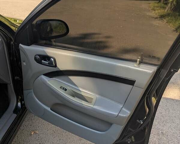 Черный Шевроле Лачетти, объемом двигателя 1.8 л и пробегом 134 тыс. км за 6450 $, фото 17 на Automoto.ua