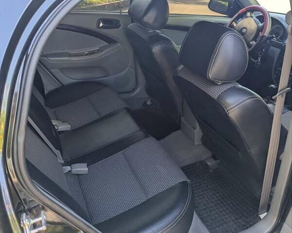 Черный Шевроле Лачетти, объемом двигателя 1.8 л и пробегом 134 тыс. км за 6450 $, фото 25 на Automoto.ua