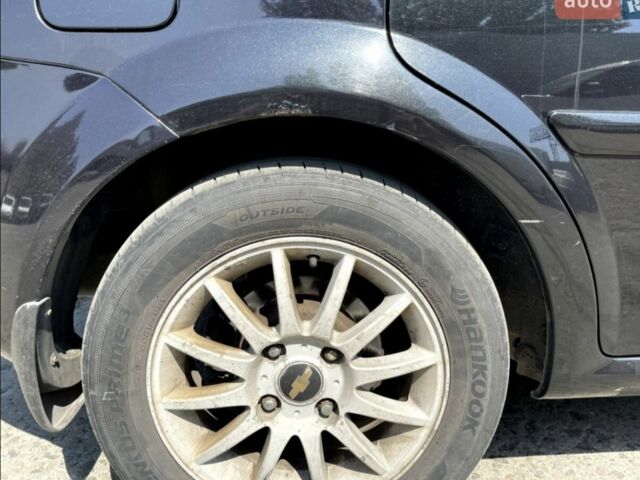 Черный Шевроле Лачетти, объемом двигателя 1.6 л и пробегом 325 тыс. км за 4500 $, фото 7 на Automoto.ua