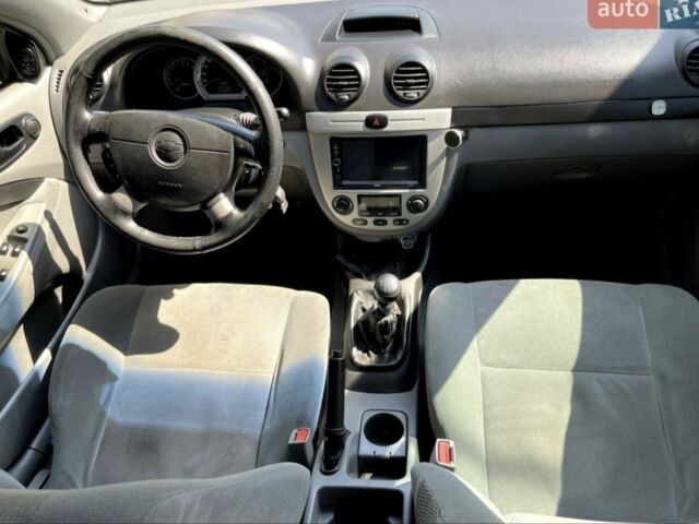 Черный Шевроле Лачетти, объемом двигателя 1.6 л и пробегом 325 тыс. км за 4500 $, фото 5 на Automoto.ua