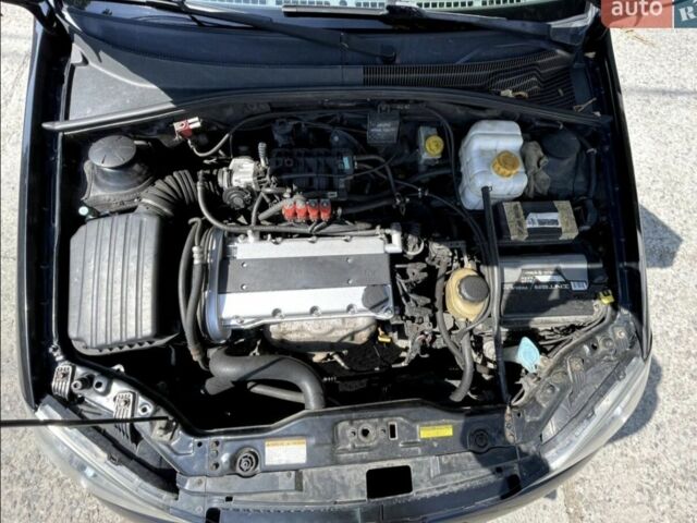 Черный Шевроле Лачетти, объемом двигателя 1.6 л и пробегом 325 тыс. км за 4500 $, фото 4 на Automoto.ua