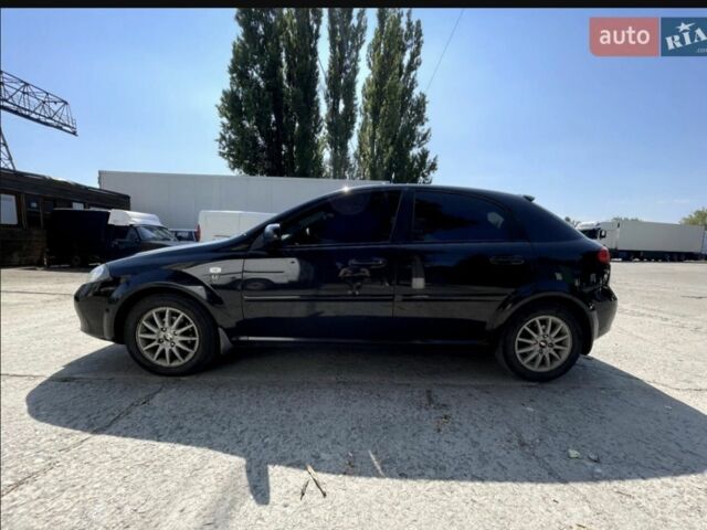 Черный Шевроле Лачетти, объемом двигателя 1.6 л и пробегом 325 тыс. км за 4500 $, фото 1 на Automoto.ua