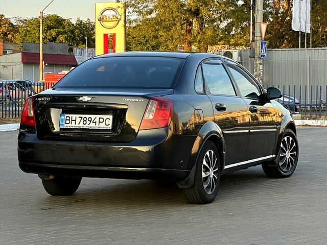 Черный Шевроле Лачетти, объемом двигателя 1.8 л и пробегом 450 тыс. км за 3499 $, фото 3 на Automoto.ua