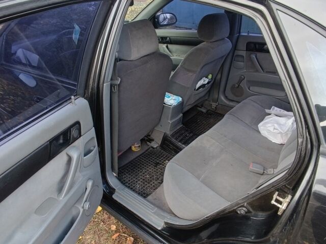 Черный Шевроле Лачетти, объемом двигателя 1.6 л и пробегом 259 тыс. км за 3500 $, фото 14 на Automoto.ua