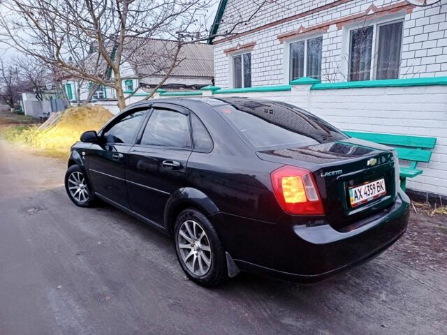 Черный Шевроле Лачетти, объемом двигателя 1.8 л и пробегом 241 тыс. км за 4300 $, фото 1 на Automoto.ua