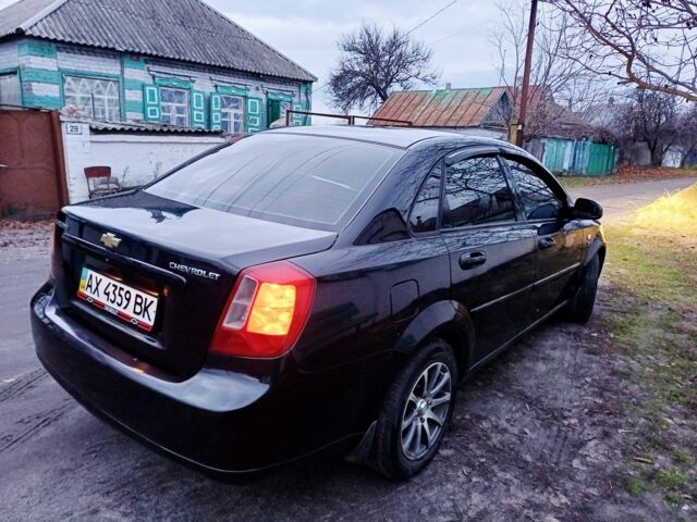 Черный Шевроле Лачетти, объемом двигателя 1.8 л и пробегом 241 тыс. км за 4300 $, фото 12 на Automoto.ua