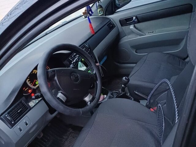 Черный Шевроле Лачетти, объемом двигателя 1.8 л и пробегом 241 тыс. км за 4300 $, фото 2 на Automoto.ua