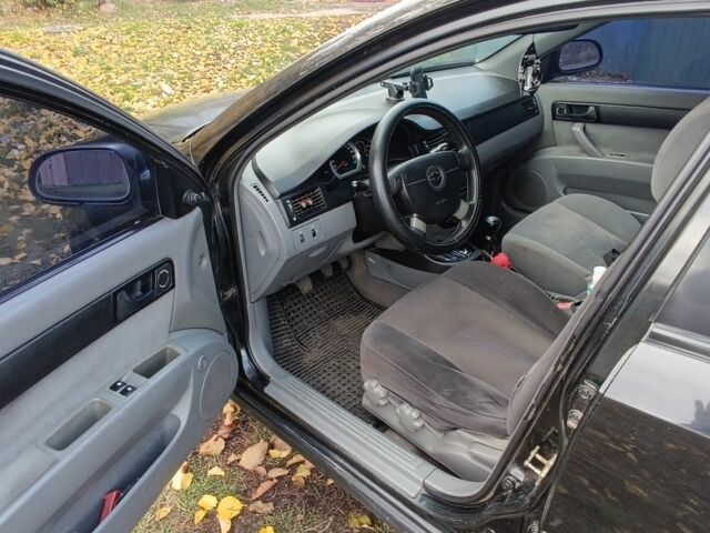 Черный Шевроле Лачетти, объемом двигателя 1.6 л и пробегом 259 тыс. км за 3500 $, фото 11 на Automoto.ua