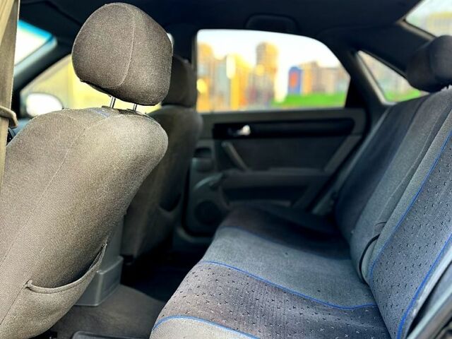 Черный Шевроле Лачетти, объемом двигателя 1.8 л и пробегом 450 тыс. км за 3499 $, фото 7 на Automoto.ua