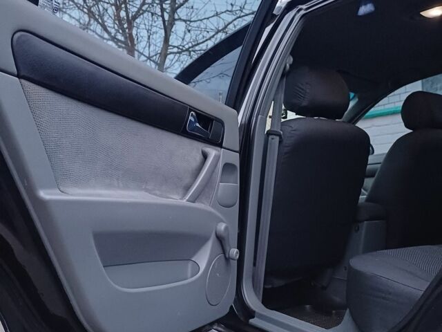 Черный Шевроле Лачетти, объемом двигателя 1.8 л и пробегом 241 тыс. км за 4300 $, фото 11 на Automoto.ua