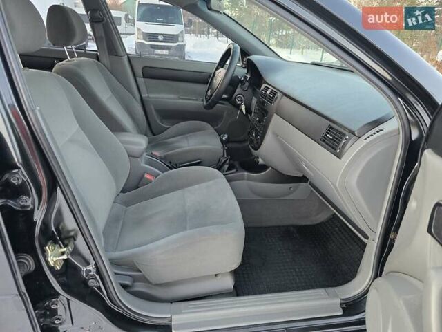 Черный Шевроле Лачетти, объемом двигателя 1.8 л и пробегом 135 тыс. км за 4499 $, фото 48 на Automoto.ua