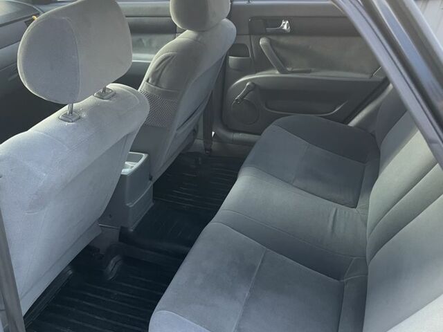 Черный Шевроле Лачетти, объемом двигателя 1.8 л и пробегом 298 тыс. км за 4200 $, фото 6 на Automoto.ua