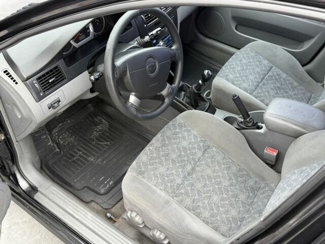 Черный Шевроле Лачетти, объемом двигателя 1.8 л и пробегом 171 тыс. км за 4300 $, фото 6 на Automoto.ua