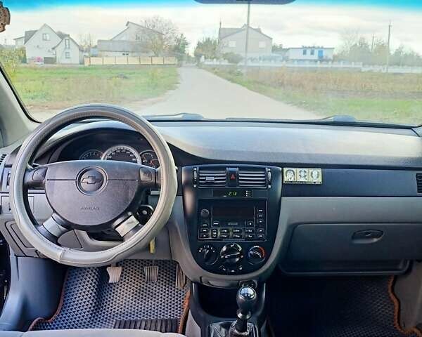 Черный Шевроле Лачетти, объемом двигателя 1.8 л и пробегом 150 тыс. км за 3200 $, фото 13 на Automoto.ua