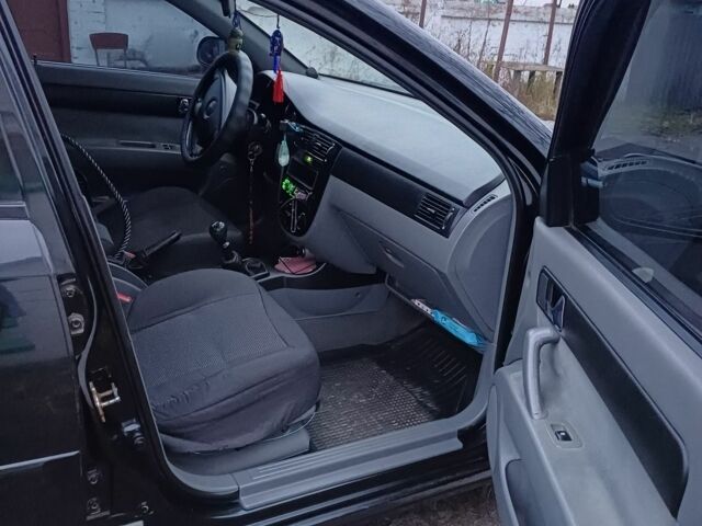 Черный Шевроле Лачетти, объемом двигателя 1.8 л и пробегом 241 тыс. км за 4300 $, фото 8 на Automoto.ua