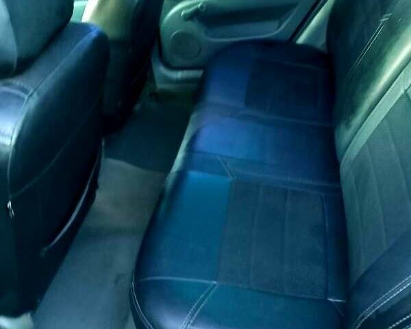 Черный Шевроле Лачетти, объемом двигателя 1.6 л и пробегом 195 тыс. км за 3350 $, фото 5 на Automoto.ua