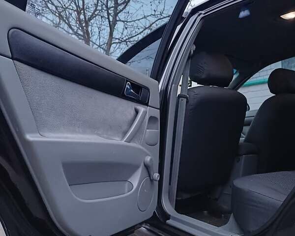 Черный Шевроле Лачетти, объемом двигателя 1.8 л и пробегом 241 тыс. км за 4300 $, фото 10 на Automoto.ua