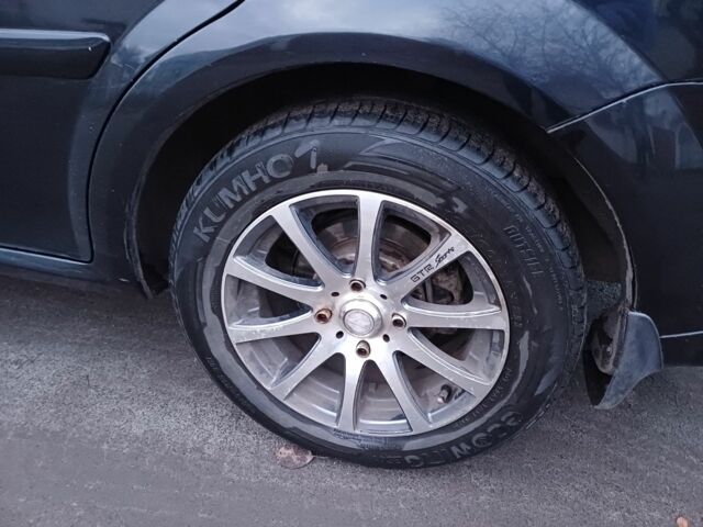 Черный Шевроле Лачетти, объемом двигателя 1.8 л и пробегом 241 тыс. км за 4300 $, фото 10 на Automoto.ua