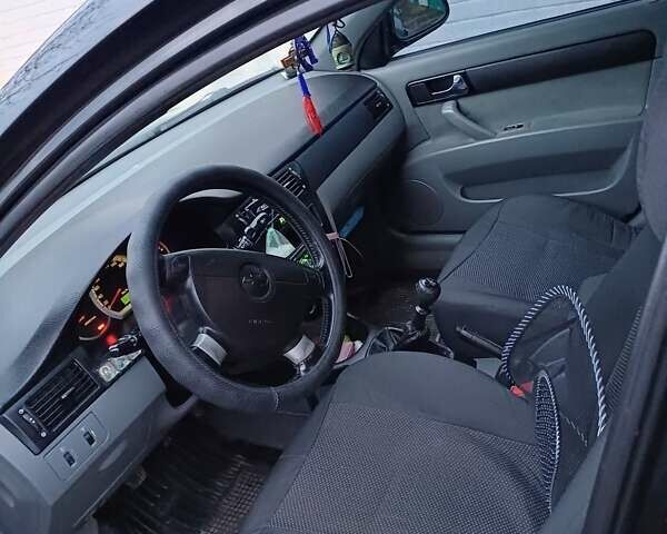 Черный Шевроле Лачетти, объемом двигателя 1.8 л и пробегом 241 тыс. км за 4300 $, фото 1 на Automoto.ua