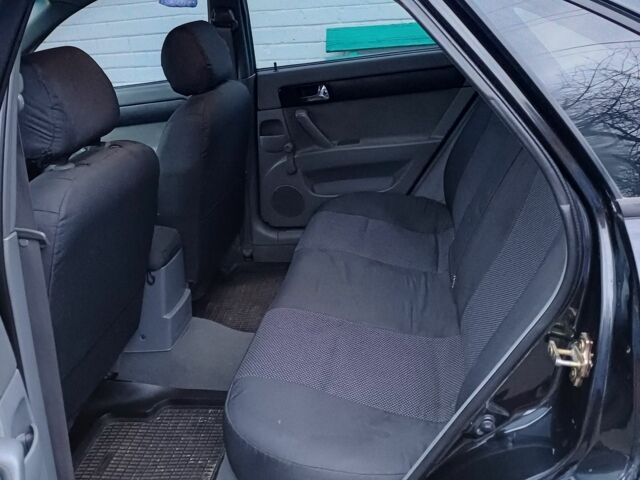 Черный Шевроле Лачетти, объемом двигателя 1.8 л и пробегом 241 тыс. км за 4300 $, фото 3 на Automoto.ua